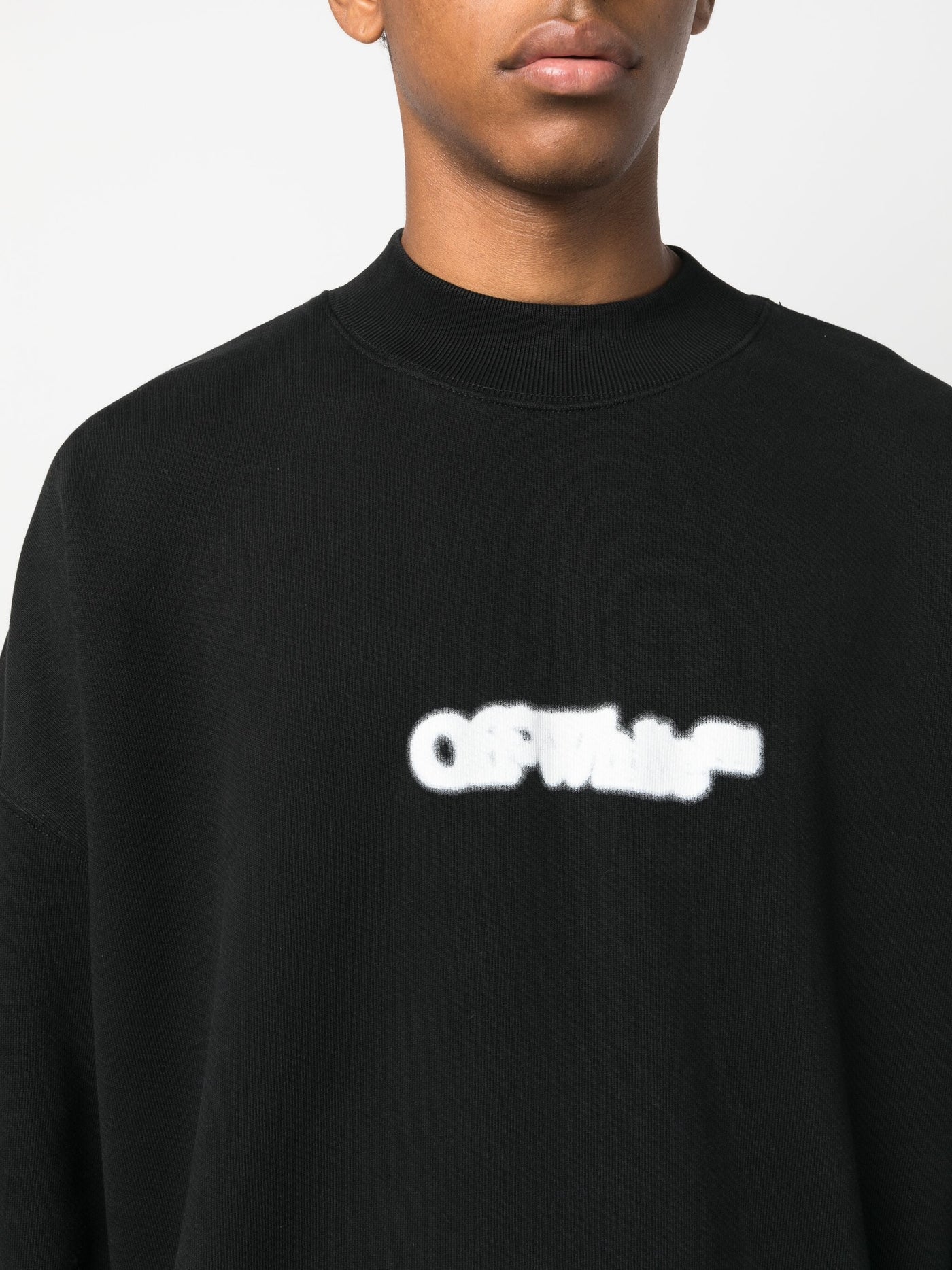 Off-White Blurr Book Over Black Sweatshirt