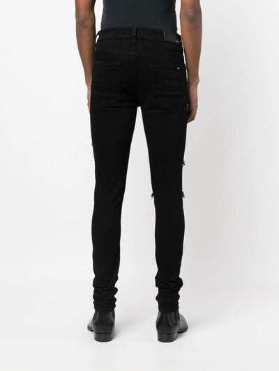 Amiri Leather Thrasher Ripped Jeans in Black