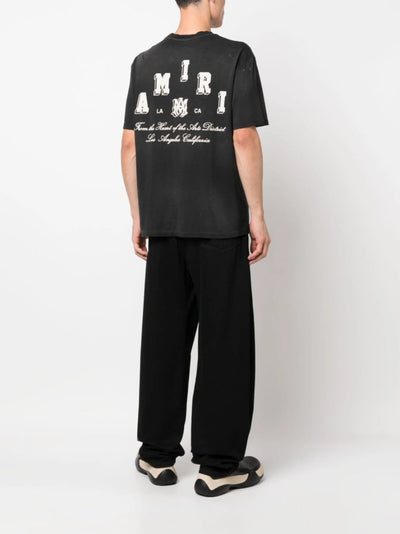Amiri Vintage Collegiate Staggered Logo T-Shirt in Black