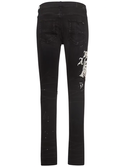 Amiri Wes Lang – Schwarze Jeans mit gealtertem Reaper-Logo