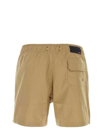 Amiri Core Printed Logo Swim Shorts in Tan/Brown