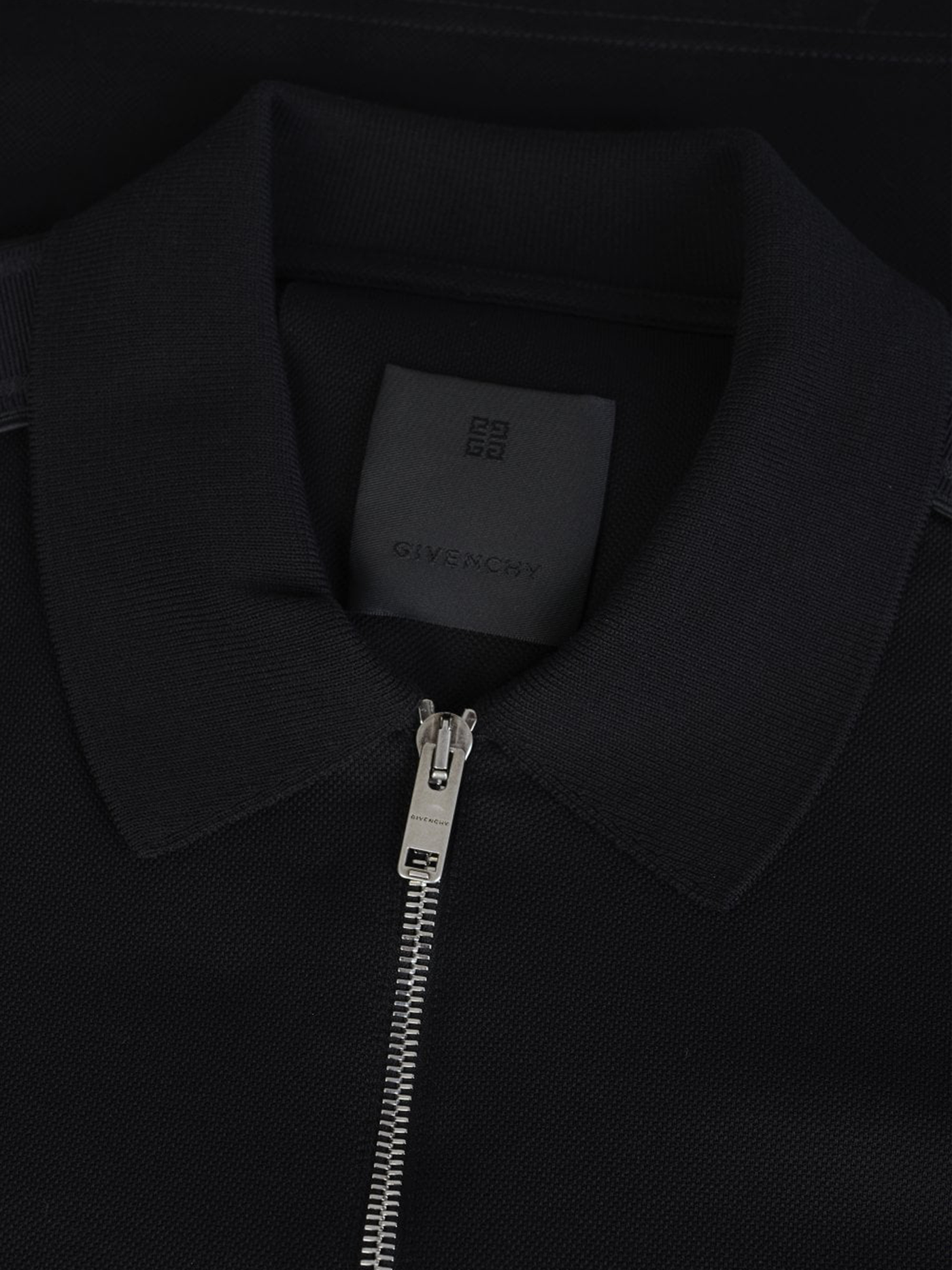 Givenchy – Schwarzes Polohemd mit seitlichem Logo und Reißverschluss