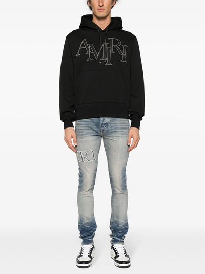 Amiri Staggered Logo Hoodie in Black