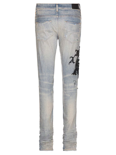 Amiri Wes Lang Reaper Logo Clay Indigo Jeans in Blue