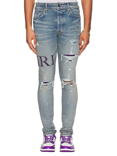 Amiri Serif Logo Clay Indigo Ripped Jeans in Blue